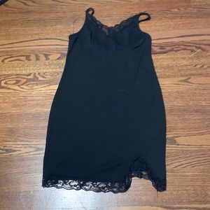 Black bodycon lacy dress with a slit